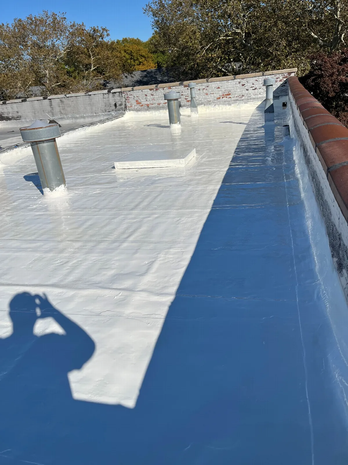 After: EPDM roof recoated with EPDM Coatings liquid rubber